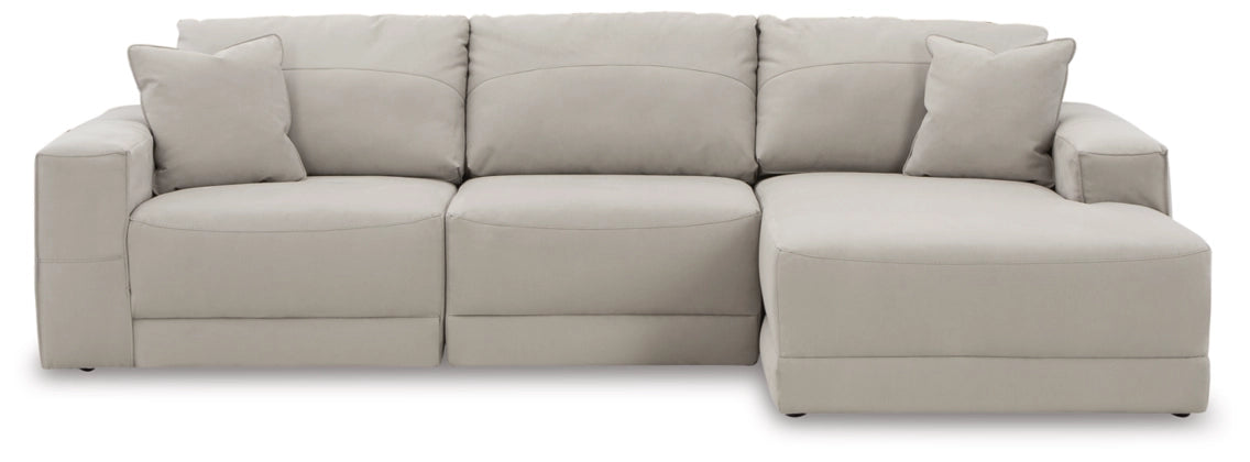 Light gray sectional sofa with chaise end, boxy arms, and padded back cushions