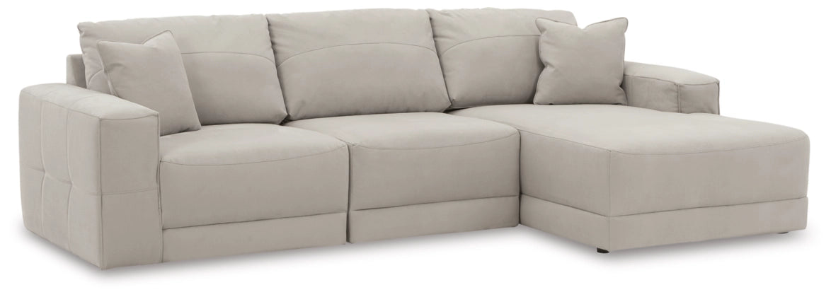 Light gray sectional sofa with chaise on the right, square arms and plush seat cushions