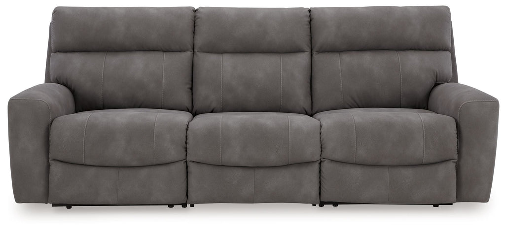 Slate gray power reclining sectional sofa with three seat sections and padded back cushions