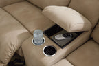 Beige power reclining sectional seat with built-in cup holder and media pocket in arm