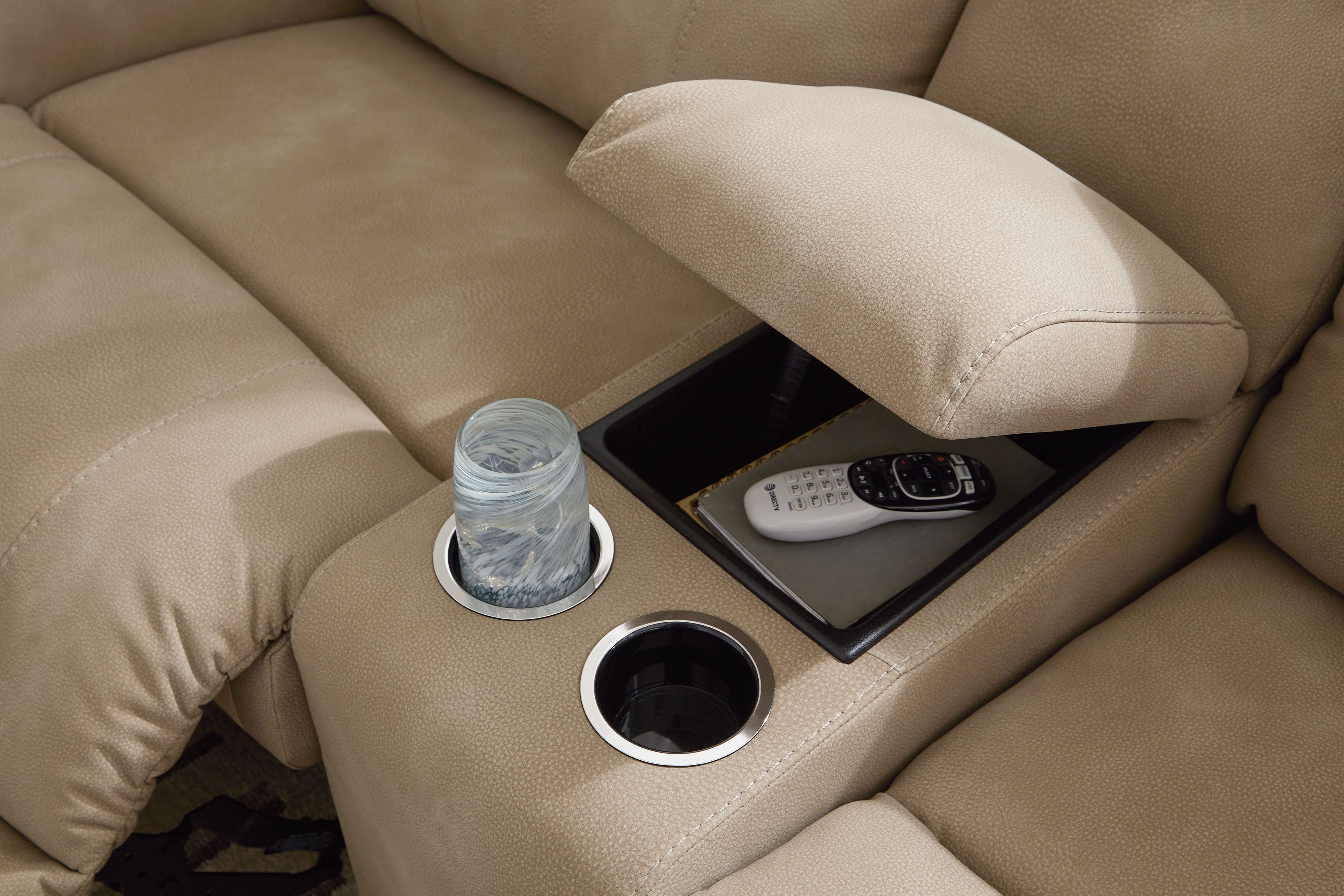 Beige power reclining sectional seat with built-in cup holder and media pocket in arm