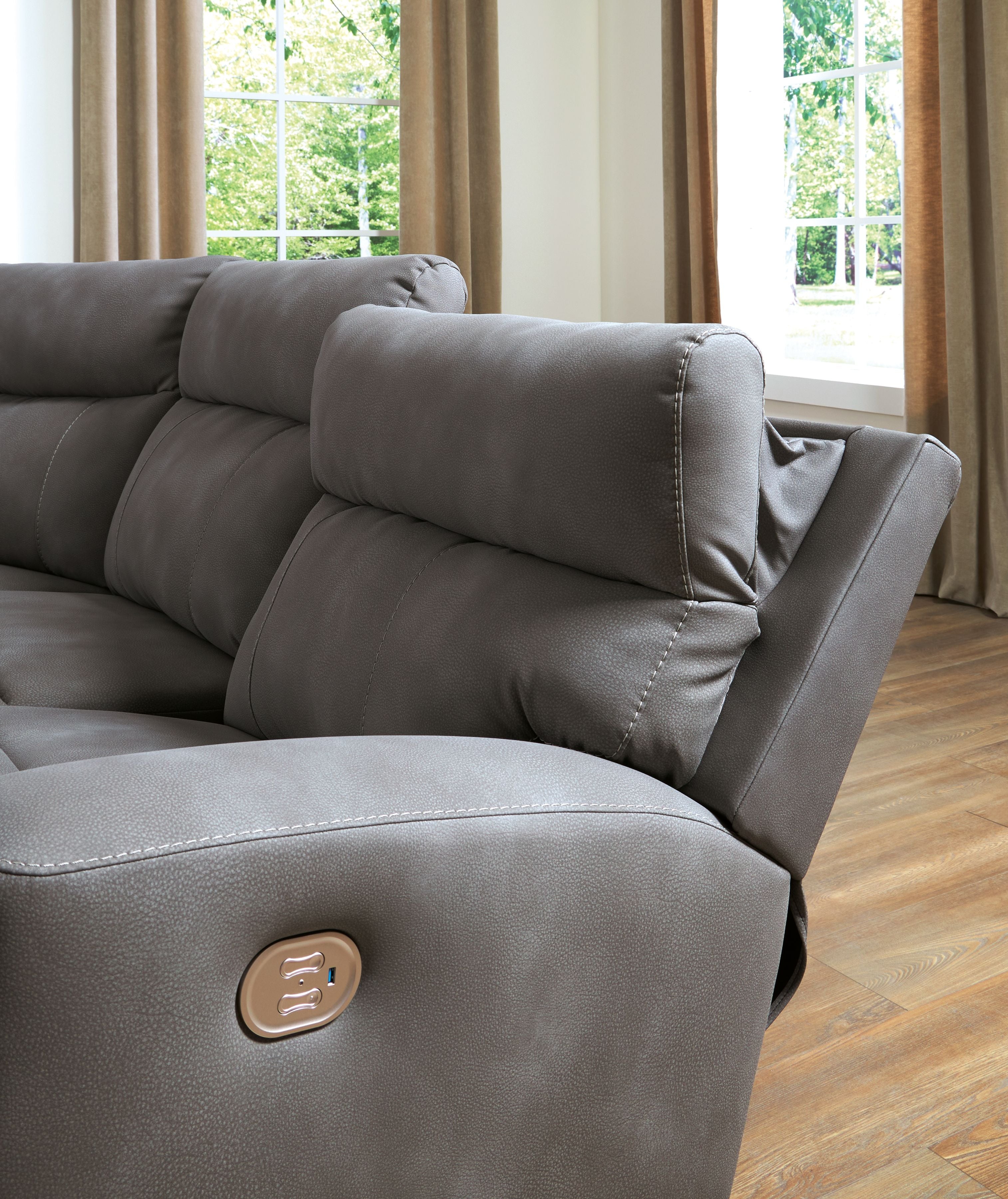 Slate gray power reclining sectional corner seat with side control button and rounded arm