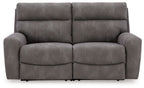 Dark gray power reclining loveseat sofa with two padded seats