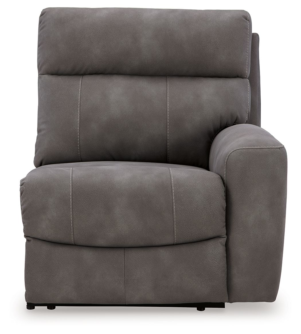 Power reclining armchair with cushioned back and padded arm, dark gray upholstery