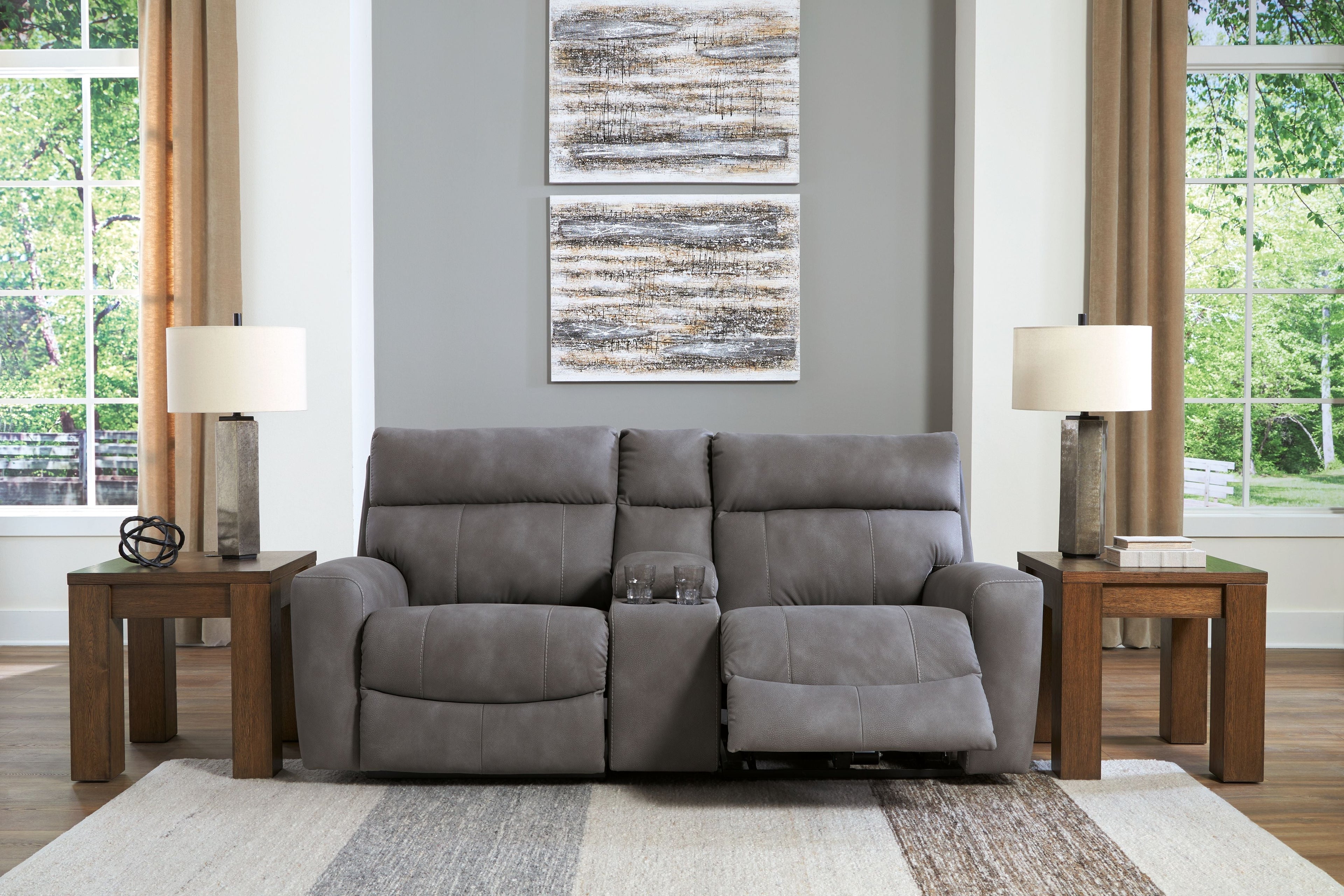 Power reclining sofa with padded arms and center console pad, dark gray fabric