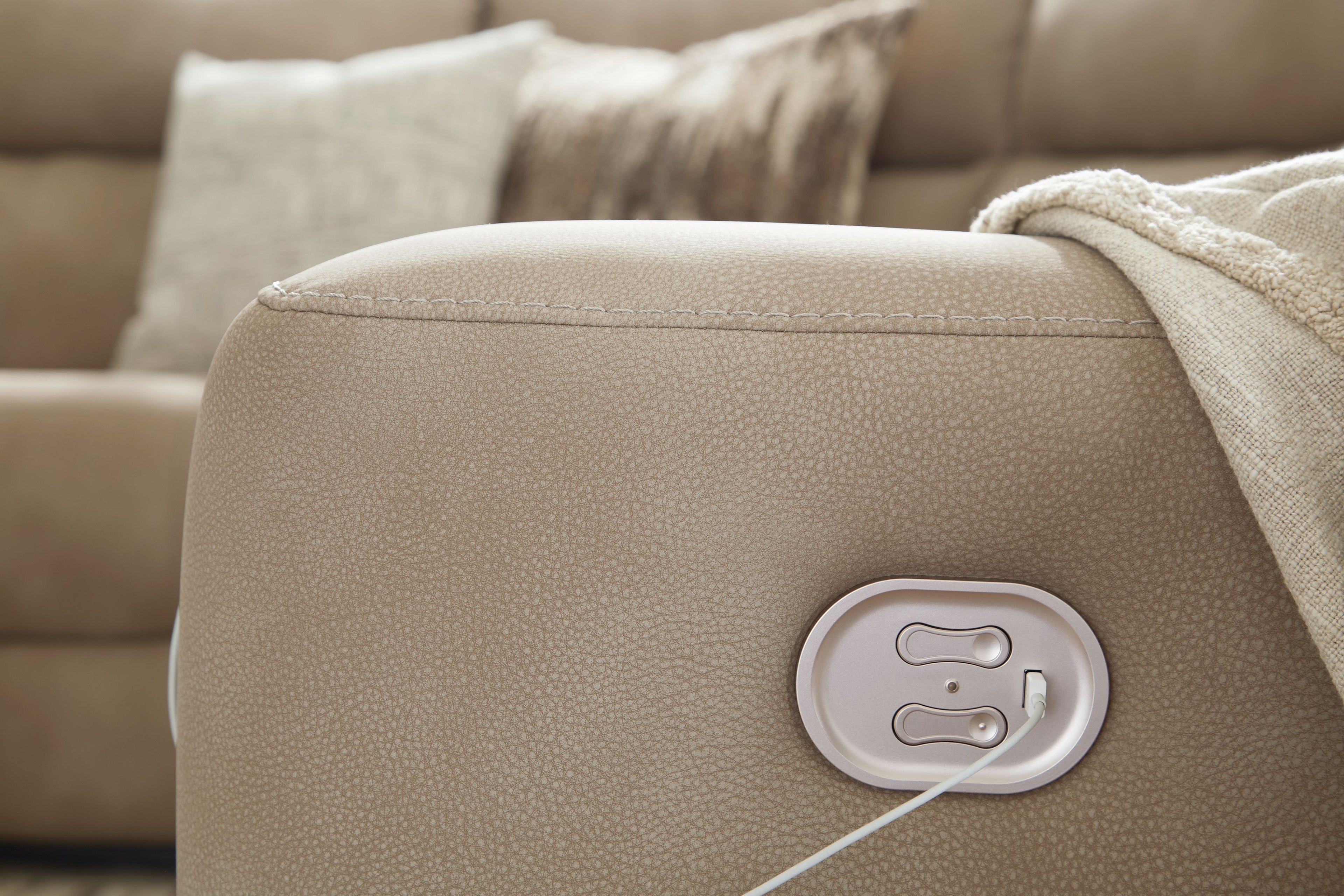 Light beige power recliner backrest with built-in buttoned power controls