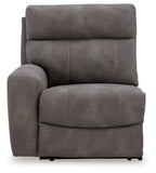 Gray power recliner chair with padded arms and upholstered seat cushion