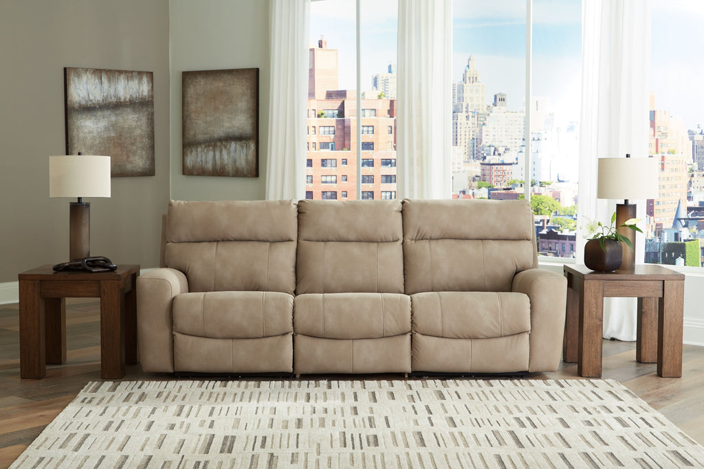 Light beige power reclining sectional with three seat backs and square legs