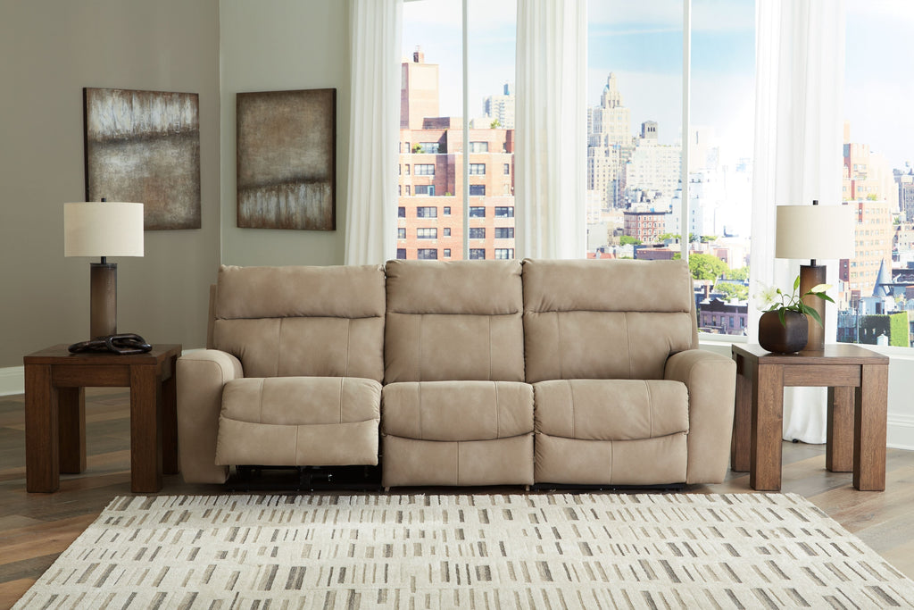 Power reclining sectional sofa in tan fabric, with multiple padded seats and armrests