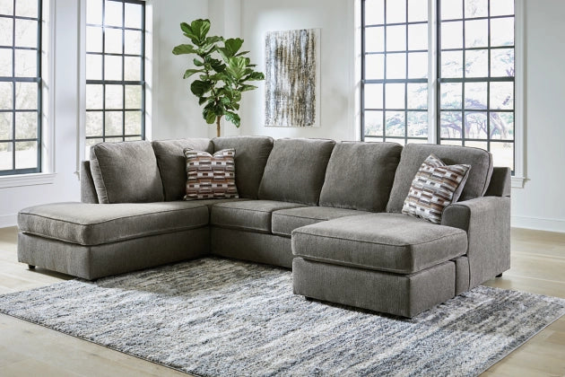 Gray sectional sofa with corner chaise and two chaise seat cushions