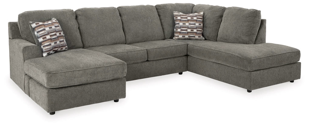 Gray sectional sofa with left-arm facing corner chaise and three seat cushions