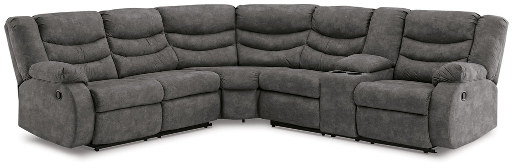 Slate gray reclining sectional sofa with tufted back and cushioned armrests