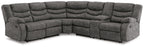 Slate gray reclining sectional sofa with tufted back and cushioned armrests