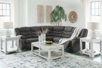 Slate gray reclining sectional sofa with chaise extension and armchair-style back cushions