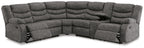 Slate gray reclining sectional sofa corner view with pull-tab recline controls