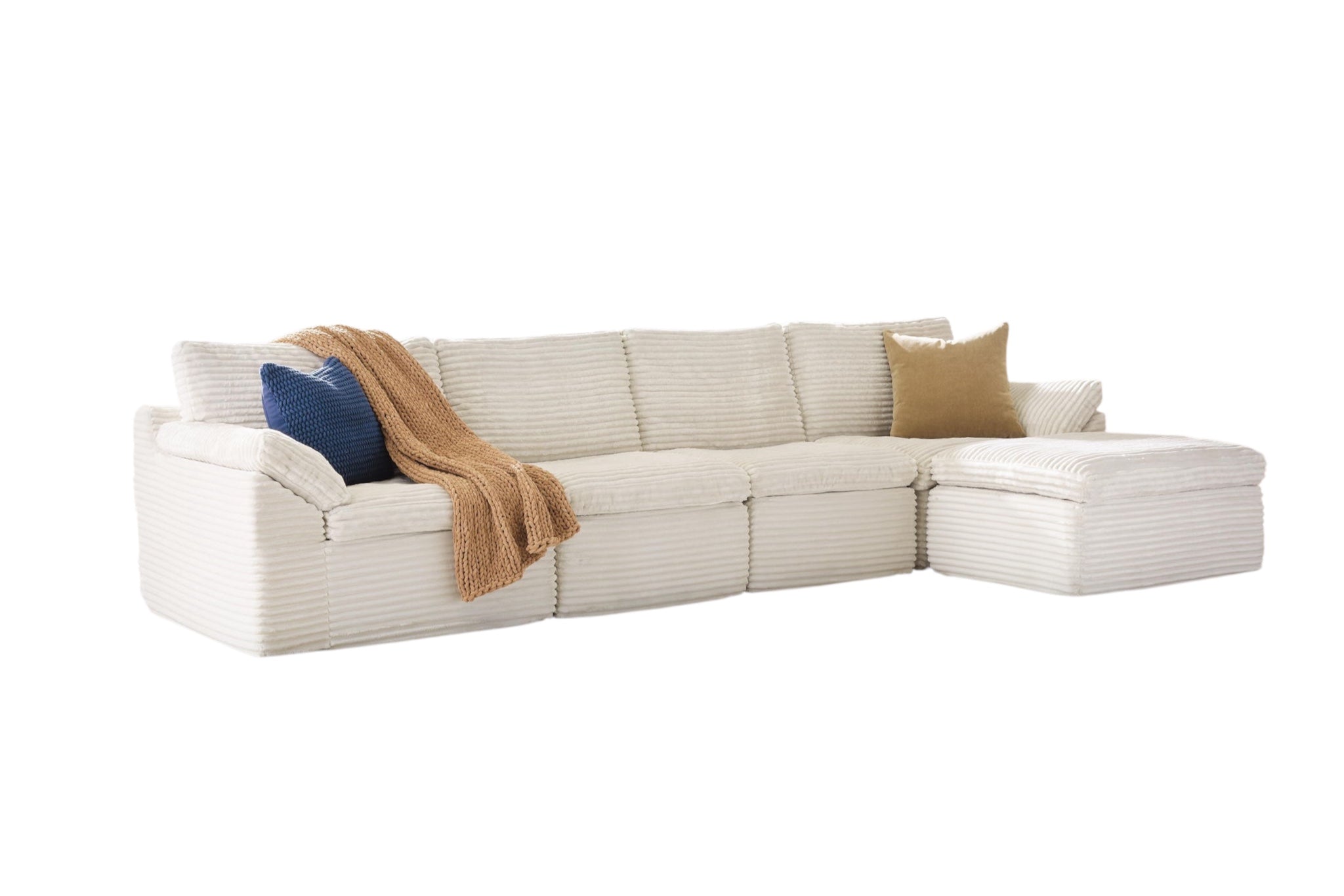 Fannin ivory 4-piece sectional with ottoman, chaise section with throw blanket