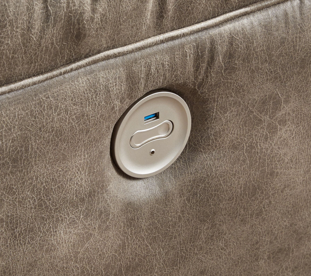 Power recline control switch on fossil brown armrest