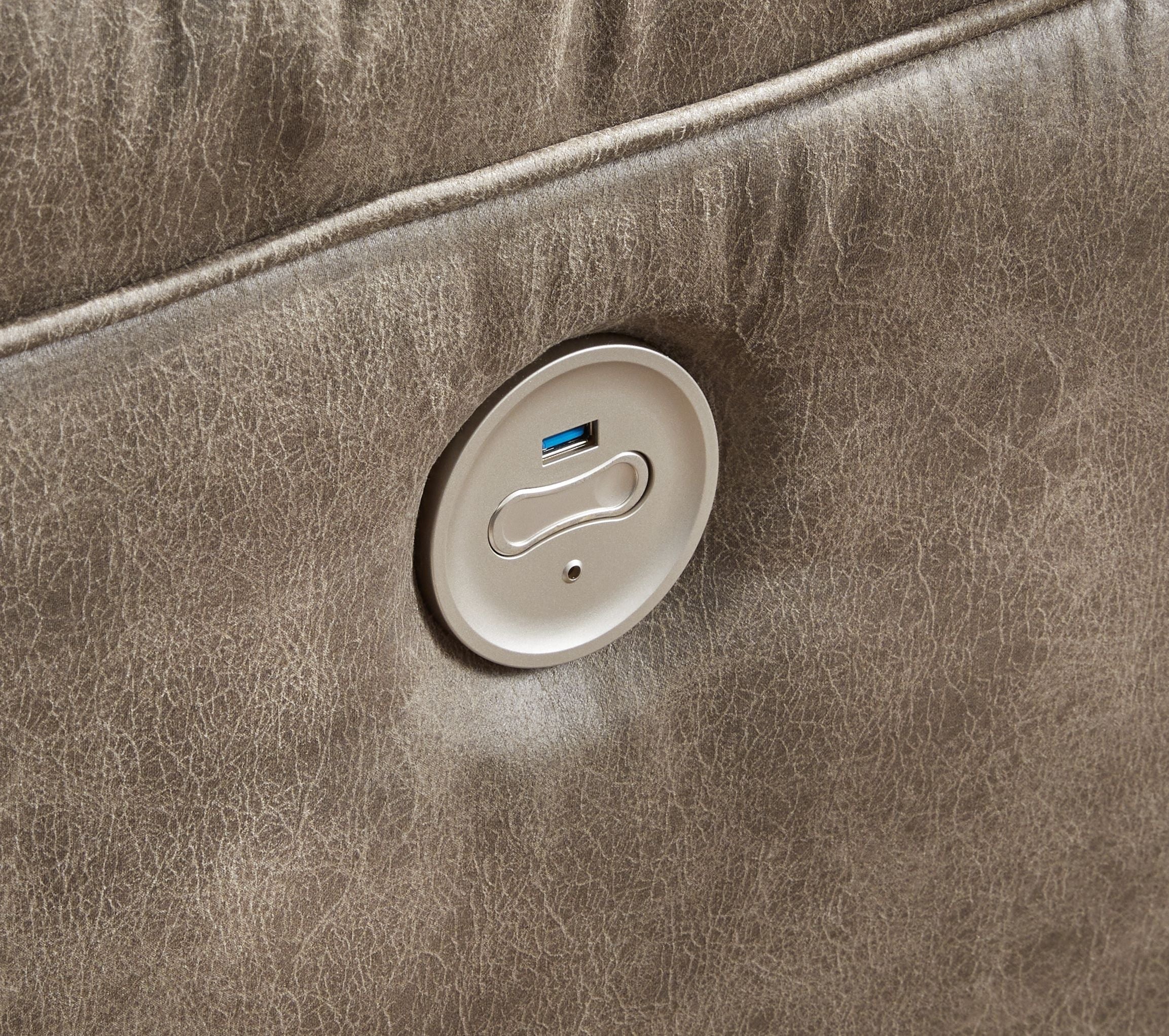 Power recline control switch on fossil brown armrest