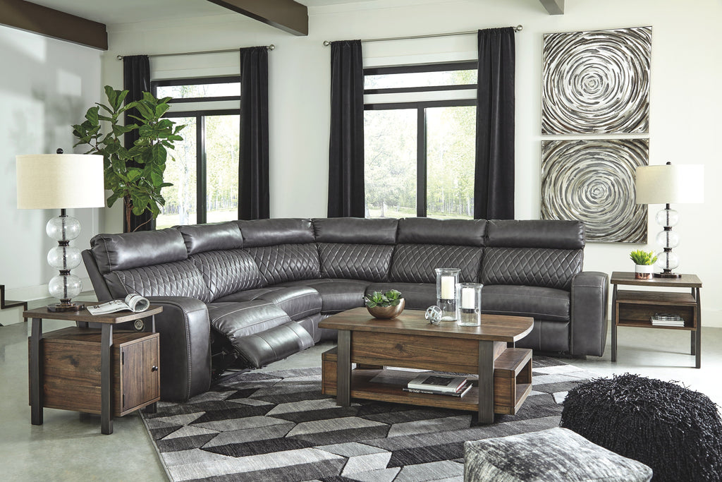 Dark gray power reclining sectional with padded armrests and multiple seats