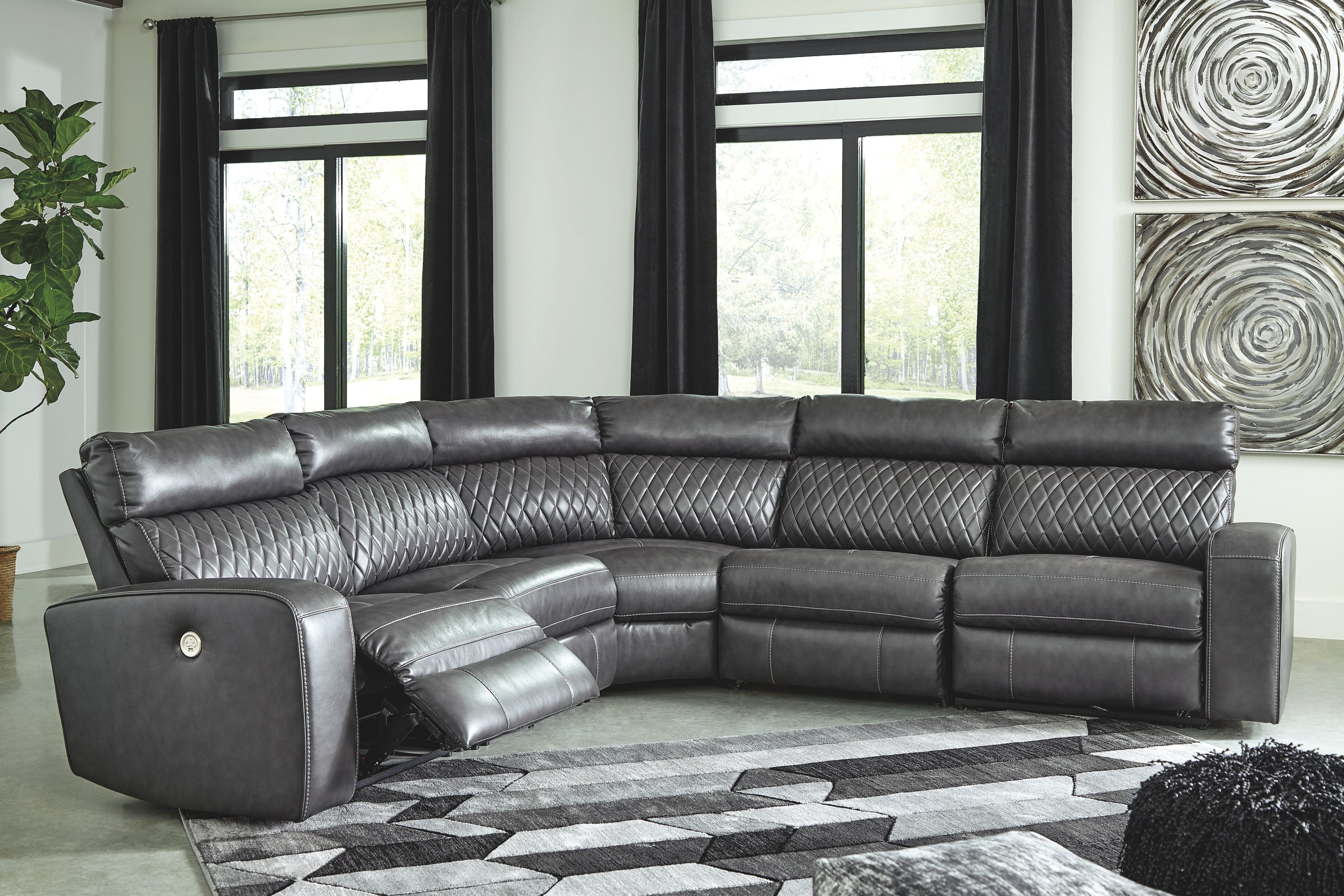 Gray power reclining sectional with diamond-textured back cushions and chaise ottoman