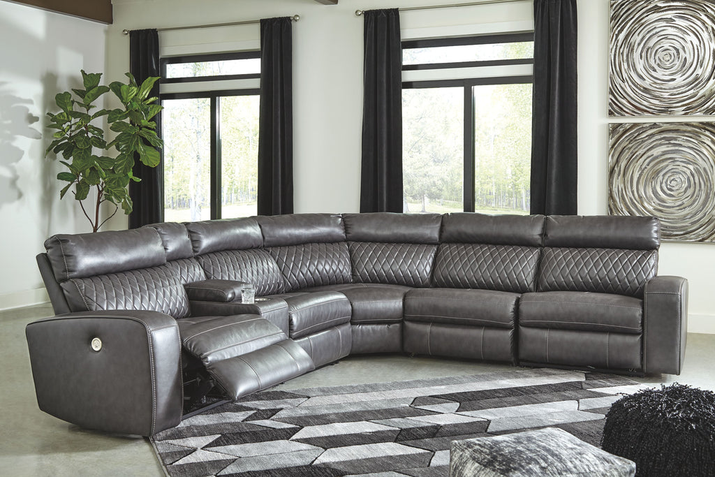 Gray power reclining sectional with curved seating and diamond-quilted back panels