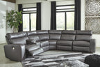 Gray power reclining sectional with curved seating and diamond-quilted back panels