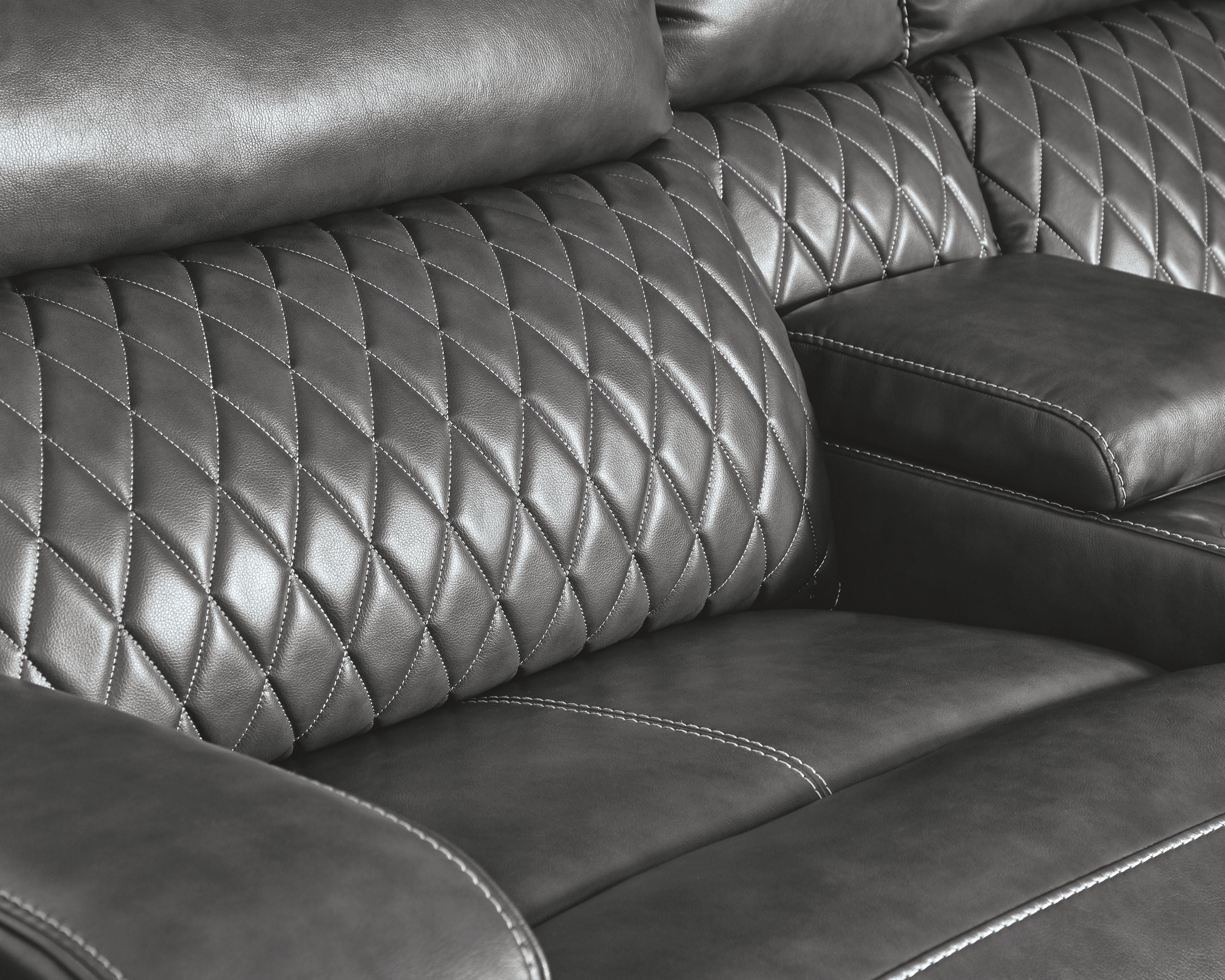Gray power reclining sectional with diamond-quilted back and padded arm recline panel