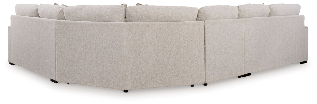 Sand beige sectional sofa corner with square arms, black feet, and layered back cushions