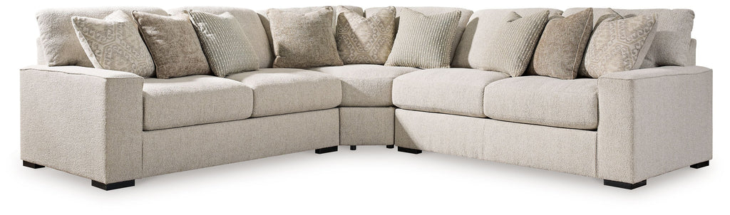 Sand beige sectional sofa with chaise, square arms, black feet, and tufted cushions
