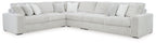 Light gray corner sectional sofa with three seat cushions and ribbed arm panels