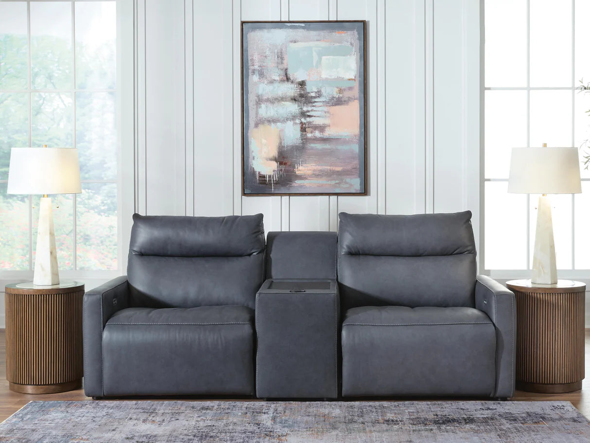 Dark gray power reclining sofa with center console and tufted back cushions
