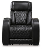 Black power recliner with tall headrest, diamond-quilted back and seat cushions