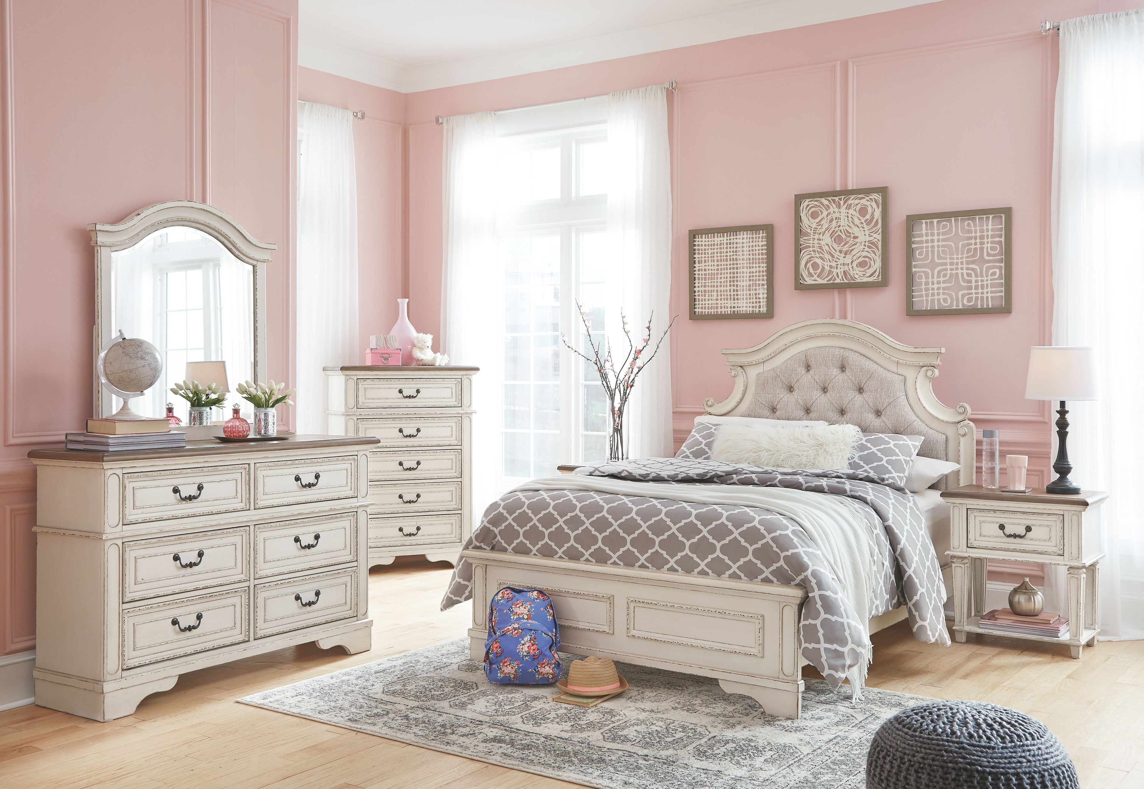 Two-tone dresser with ornate mirror and multiple drawers