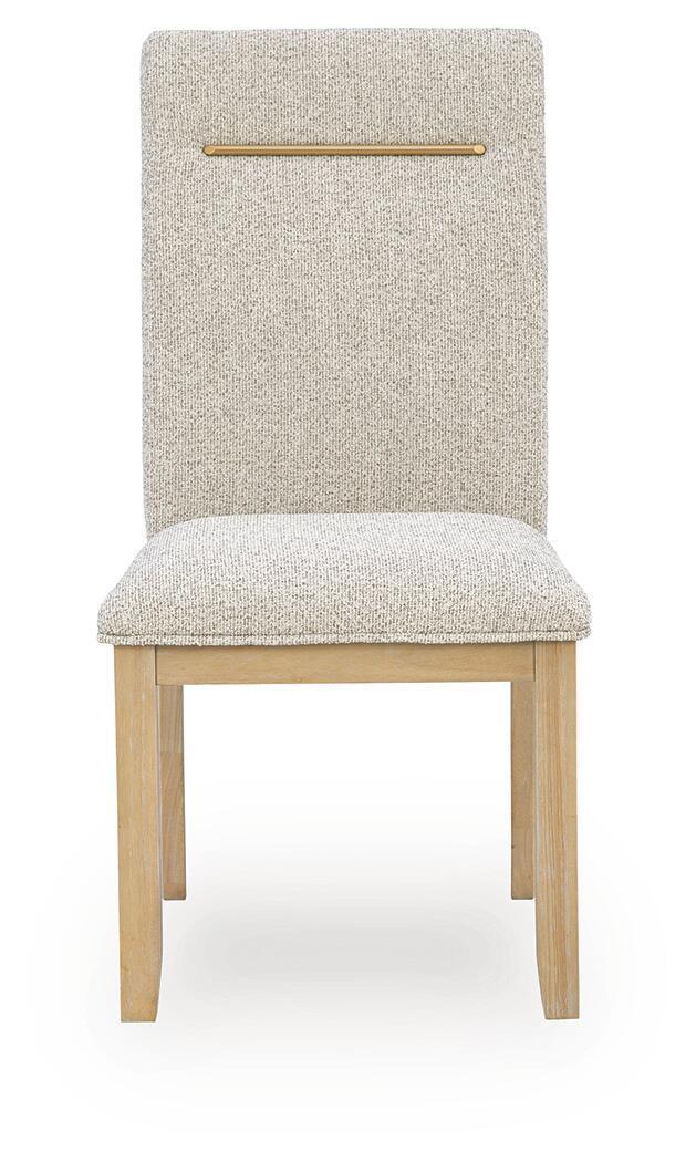 Light beige upholstered dining side chair, close front view, wooden legs and gold bar