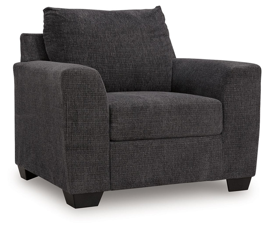 Loreo chair in dark gray textured fabric with square arms and tufted seat cushion
