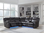 Dark carbon reclining sectional sofa with cushioned arms and visible chaise/sectional connections.