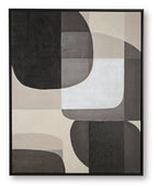 Framed abstract wall art with black, dark gray, and white rounded block shapes.