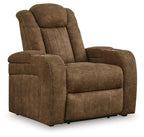 Brown power recliner chair with padded armrests and adjustable headrest