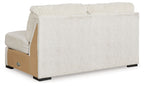 Ivory armless loveseat with ribbed backrest and upholstered sides, black feet