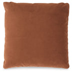 Light brown square throw pillow with textured fabric and sewn edges