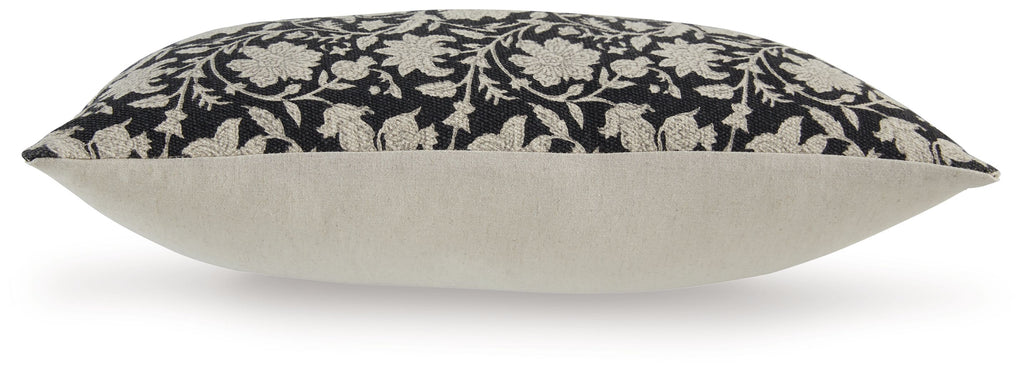 Black floral pillow with beige reverse and stitched border