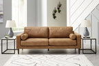 Caramel fabric sofa with rounded arm cushions and three-seat backrest