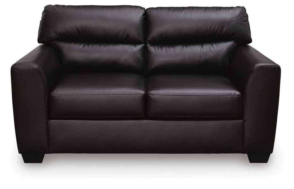 Dark leather-look loveseat with tufted backrest and two wide seat cushions