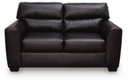 Dark leather-look loveseat with tufted backrest and two wide seat cushions