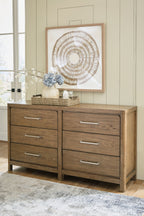 Light brown wooden dresser with six drawers and metal bar pulls, front-left view