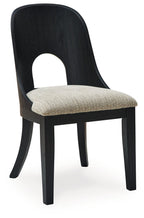 Dining side chair with beige upholstered seat and dark curved back, armless