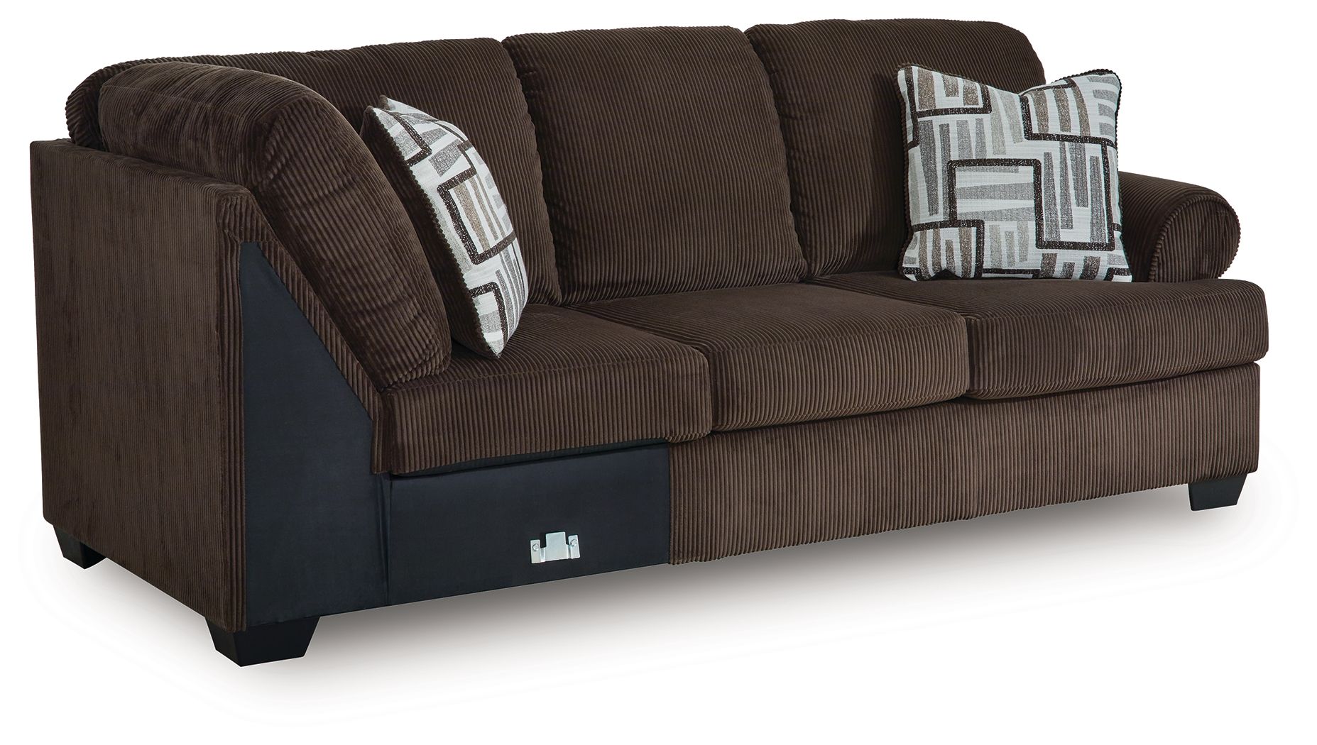 Chocolate-brown upholstered sofa with corner wedge and two geometric throw pillows