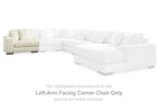 Ivory sectional corner chair with chaise and multiple seat cushions