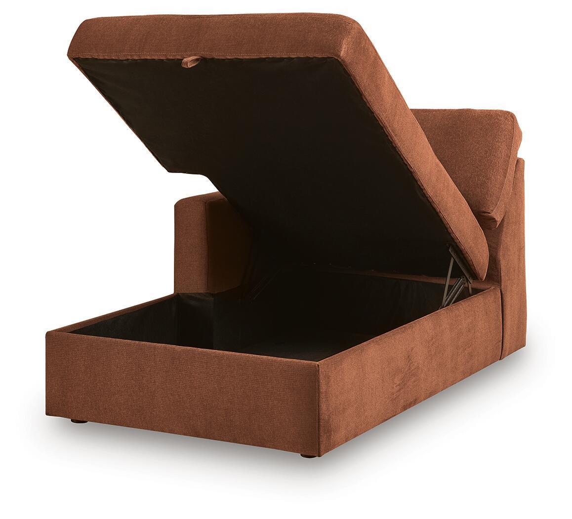 Brown corner chaise storage with lift-up lid and dark interior compartment
