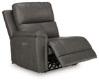 Power recliner chair with footrest extended, dark gray cushioning and side control panel